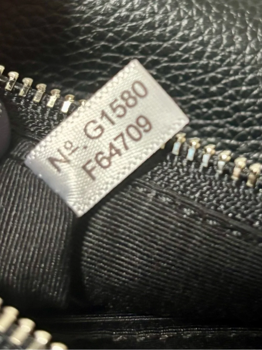 Coach Black Pebbled Leather Shearling-Trim Wristlet